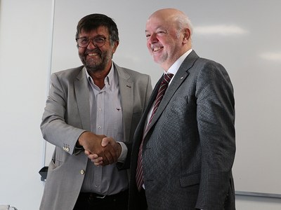 Jaume Pujol, a l'esquerra, amb el rector Daniel Crespo, en un moment de l'acte de presa de possessió