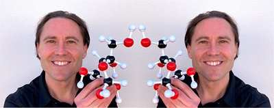 Montage of the property of chirality, the subject of Justin Zoppe’s research. It shows the researcher holding a model of glucose, the basic unit of cellulose.
